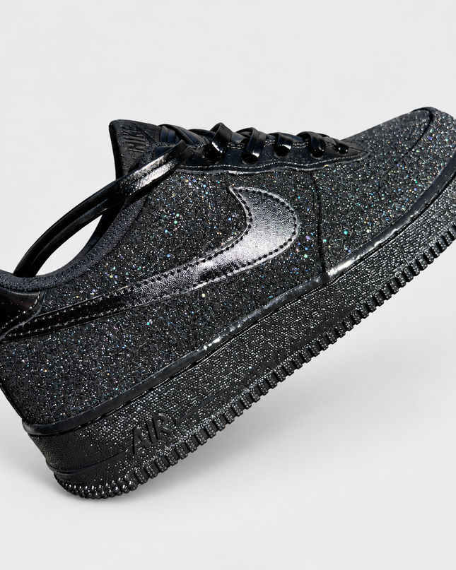 Black Glitter AF1 {Red Bottoms) on a light gray studio background
