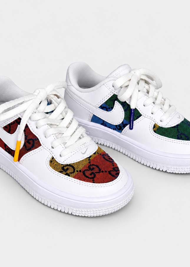 Multi color GG AF 1 (baby or toddler on a light gray studio background
